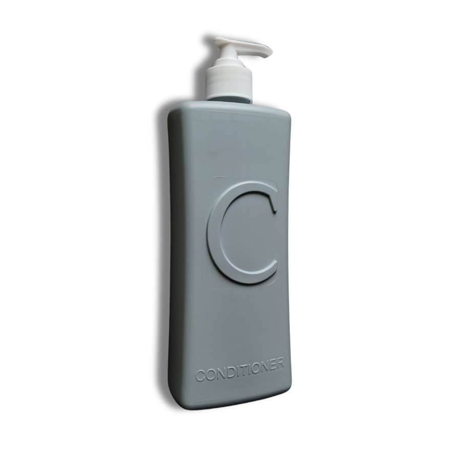 refillable conditioner bottle 1 x Single Conditioner Bottle featuring a large, raised 'C' for Conditioner that allows for easier visual identification as well as tactile identification. The back of the bottle has a Grade 1 Braille strip