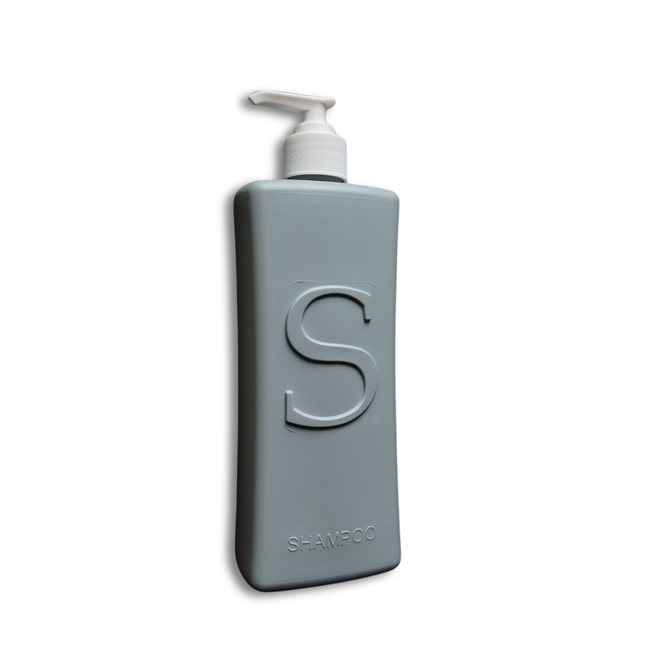 refillable shampoo bottle 1 x Single Shampoo Bottle featuring a large, raised 'C' for Conditioner that allows for easier visual identification as well as tactile identificiation. The back of the bottle has a Grade 1 Braille strip